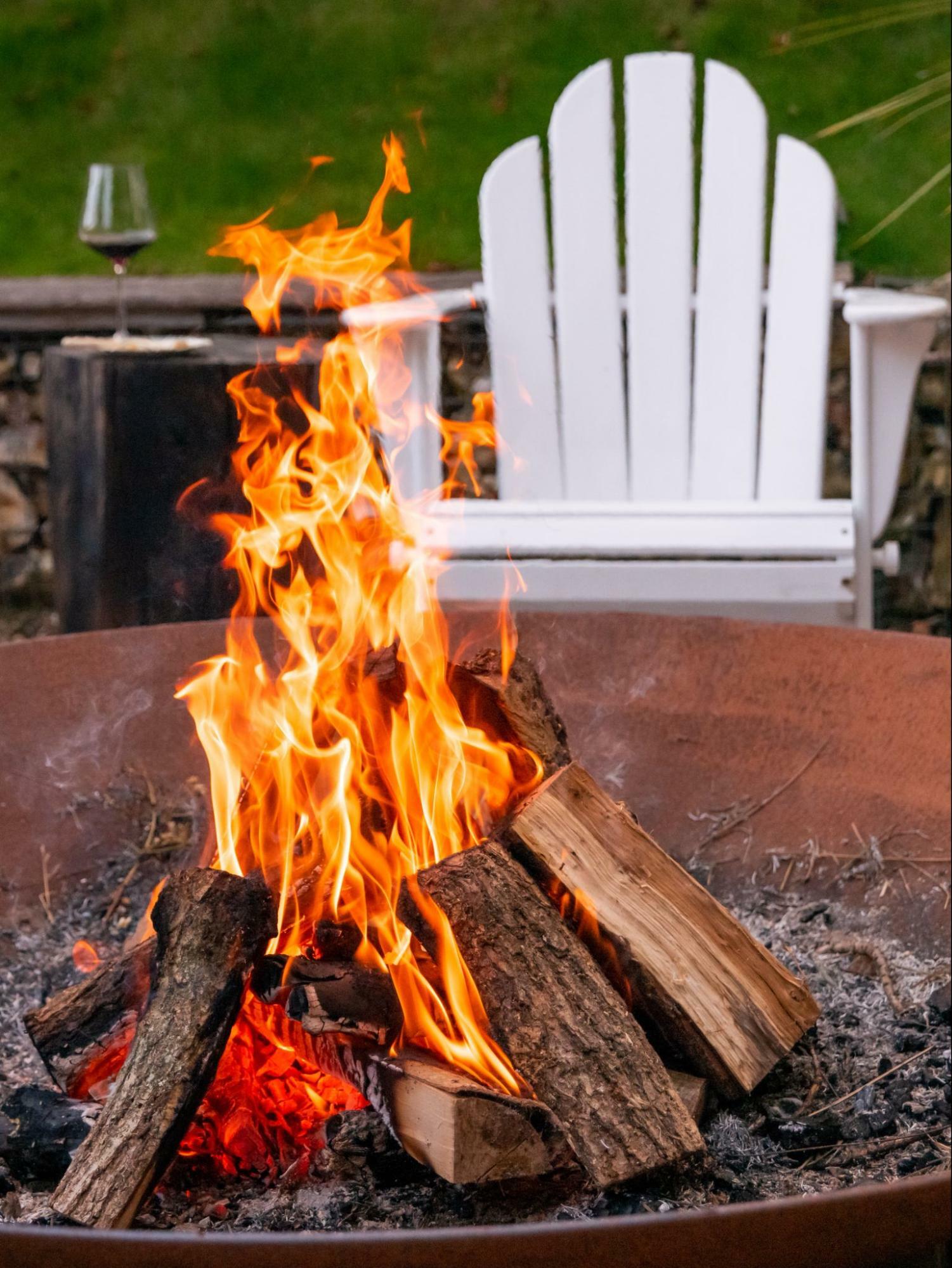 Modern Deck with Fire Pit and White Furniture